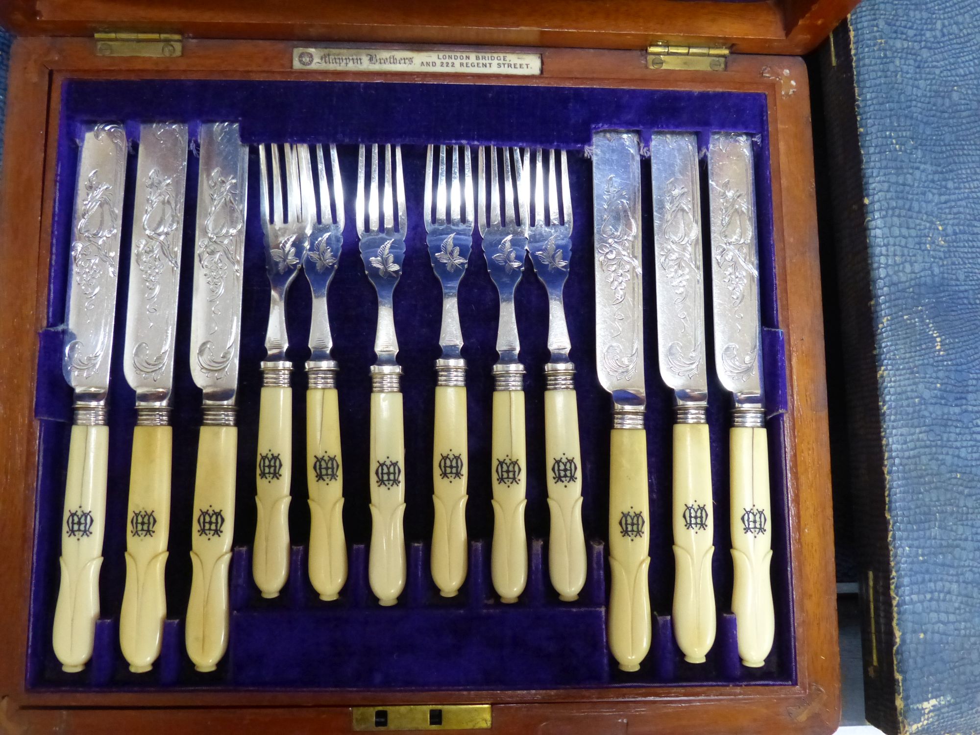 Eight assorted cased sets of silver plated cutlery including dessert eaters and a plated part toilet set.